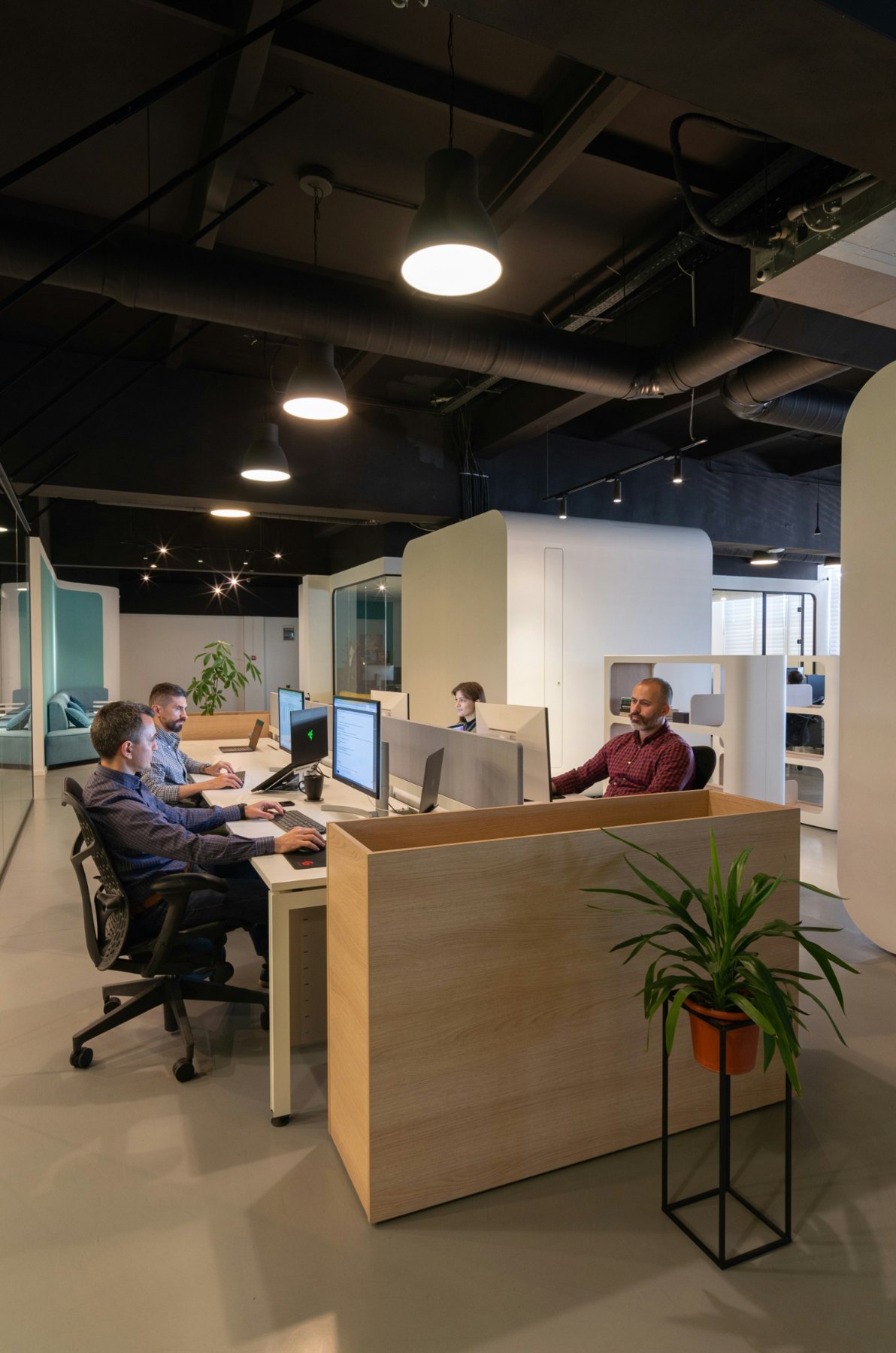Shared workspace with colleagues at their desks